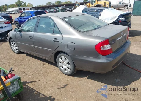2002 Toyota Camry Le from USA, damaged, VIN 4T1BE32KX2U524502